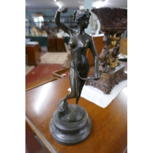 344 - Bronze nude with bow on marble base - Approx. height 33cm