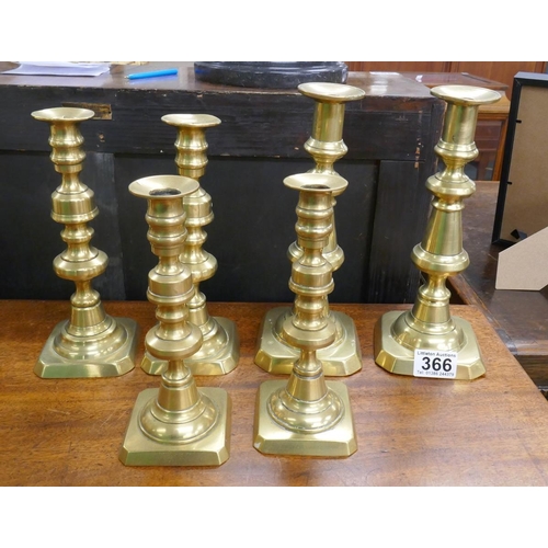 366 - 3 pairs of brass candlesticks