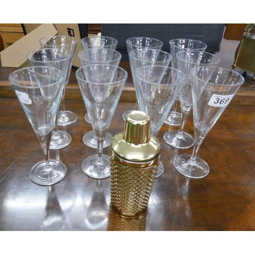 369 - Set of 12 champagne glasses and a cocktail shaker