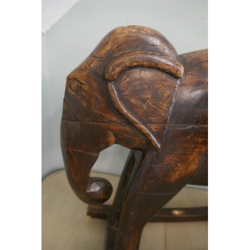 386 - Hardwood rocking elephant - Approx L: 66cm H: 50cm