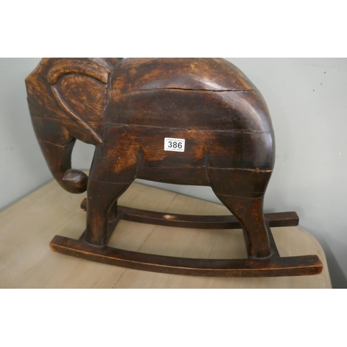 386 - Hardwood rocking elephant - Approx L: 66cm H: 50cm