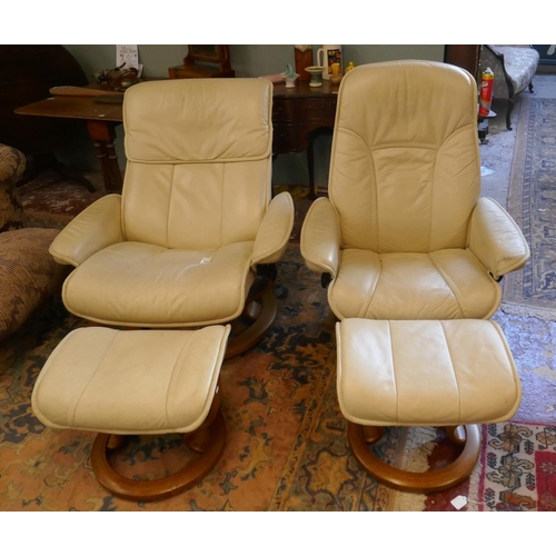 396 - Pair of Stressless reclining leather chairs with matching stools