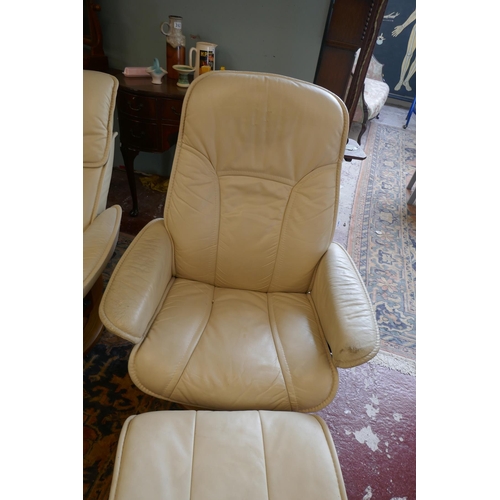 396 - Pair of Stressless reclining leather chairs with matching stools