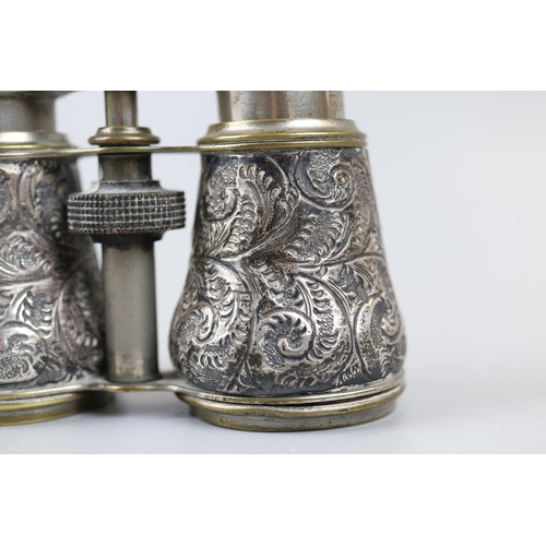 4 - 2 Opera glasses one being silver mounted