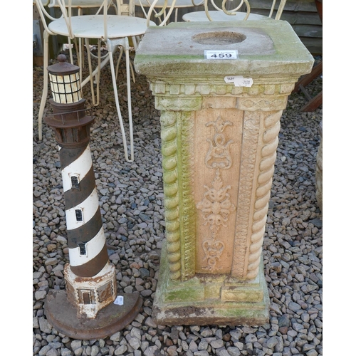 459 - Cast iron lighthouse and stone garden plinth