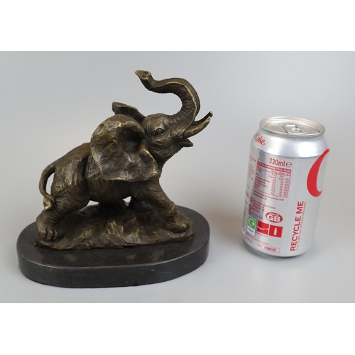 65 - Bronze elephant on marble base - Approx height 16cm