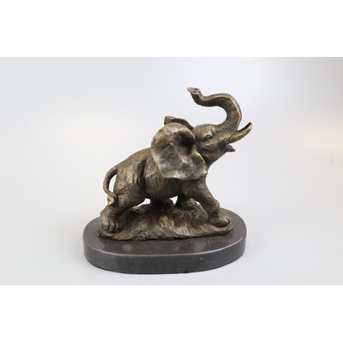 65 - Bronze elephant on marble base - Approx height 16cm