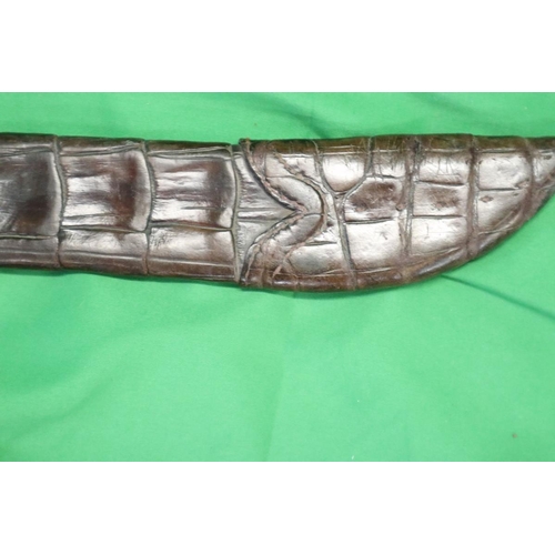 78 - Sword with horn handle in crocodile leather sheath