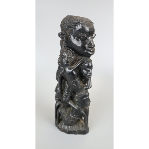 110 - Ebonised African carved figure - Approx height 24cm