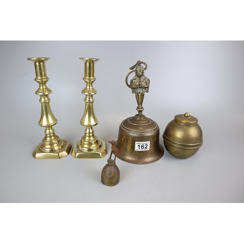 162 - Collection of brass to include an engraved bell and a Lipton souvenir tea caddy