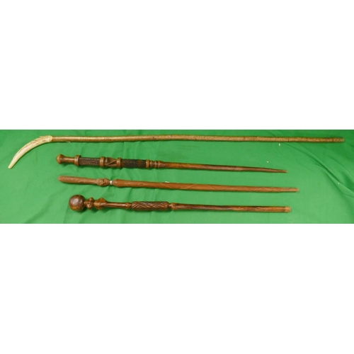 257 - Collection of walking sticks/canes