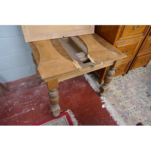 259 - Oak extending dining table