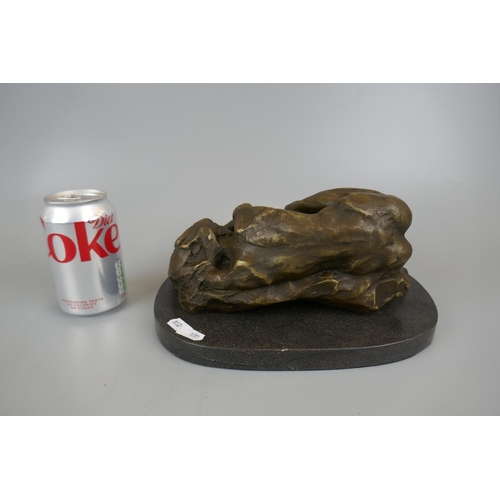 264 - Nude bronze laid down on marble base - Approx length 26cm