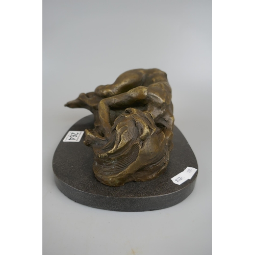 264 - Nude bronze laid down on marble base - Approx length 26cm