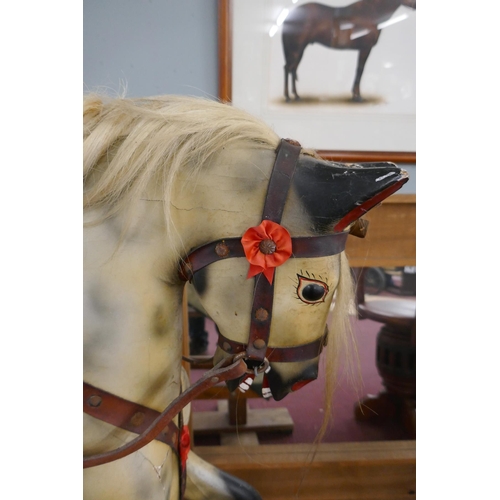 318 - Antique J Collinson and Sons of Liverpool hand carved wooden rocking horse with original saddle and ... 