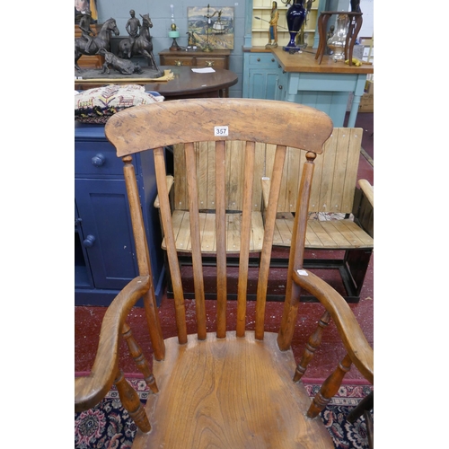 357 - Antique elm seated slatback kitchen armchair