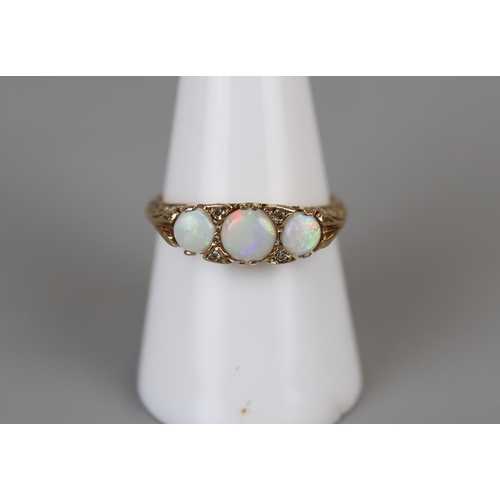 37 - Gold opal and diamond set ring - Size P