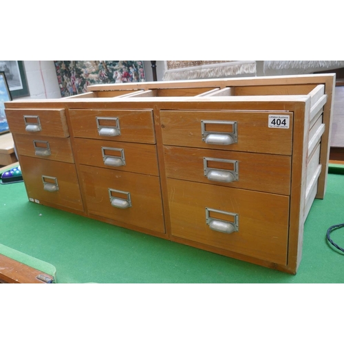 404 - Bank of 9 drawers