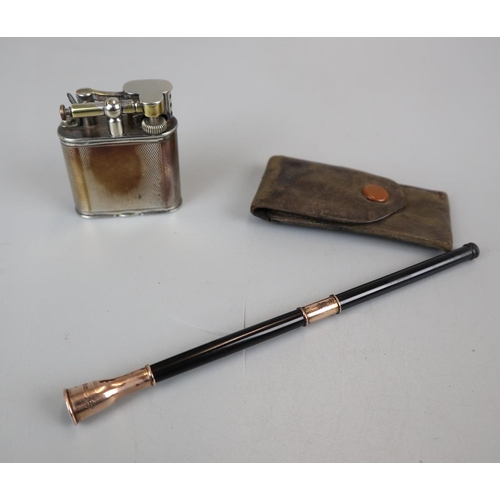 82 - Hallmarked gold Dunhill cigarette holder and Dunhill lighter