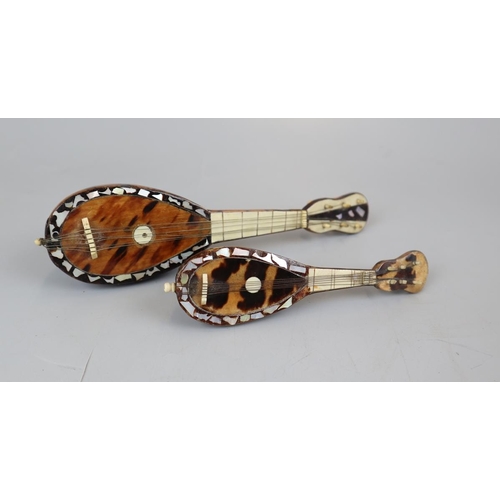 86 - Two Victorian tortoise shell miniature musical instuments