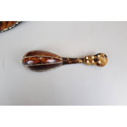 86 - Two Victorian tortoise shell miniature musical instuments