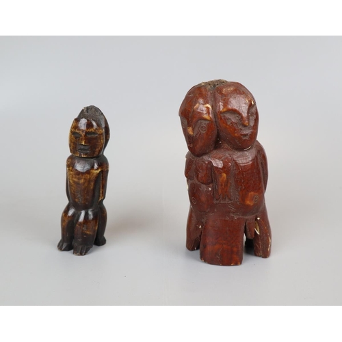 91 - 2 tribal carvings