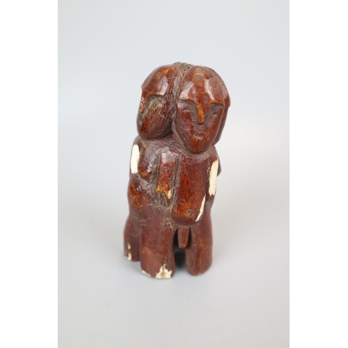 91 - 2 tribal carvings