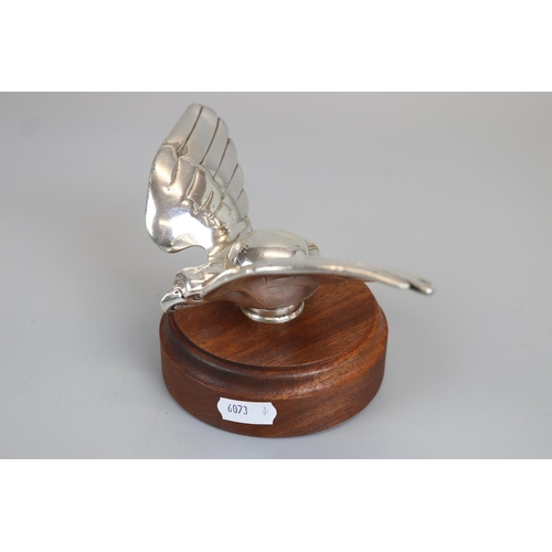 165 - Bird mascot mounted on turned wooden base