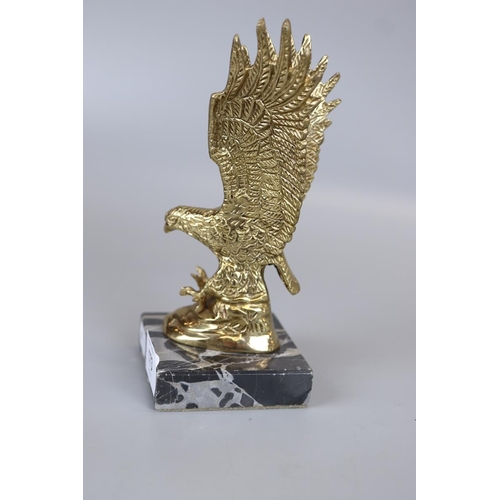 173 - Brass eagle mascot mounted on marble base