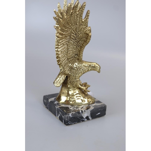 173 - Brass eagle mascot mounted on marble base