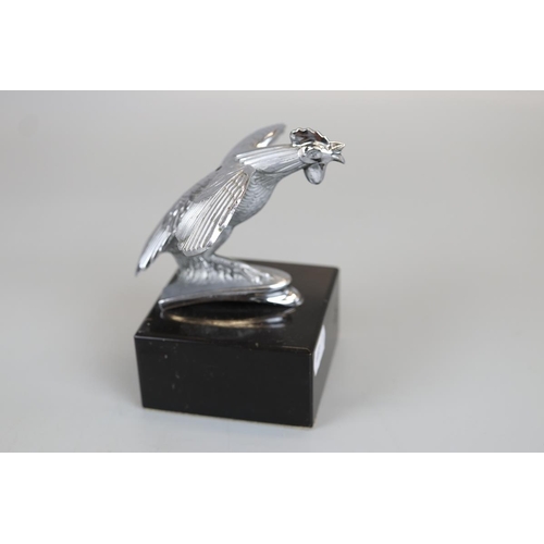 180 - Bird mascot mounted on marble base