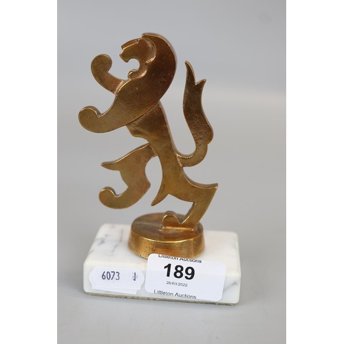 189 - Brass lion mascot mounted on marble base 