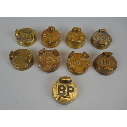 211 - Collection of oil can caps to include Shell, Pratts and BP