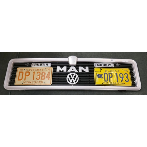 235 - Collection of badges to include Austin Morris, VW, MAN mounted on grill