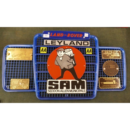 243 - Collection of badges to include SAM, Carrimore mounted on Land Rover grill