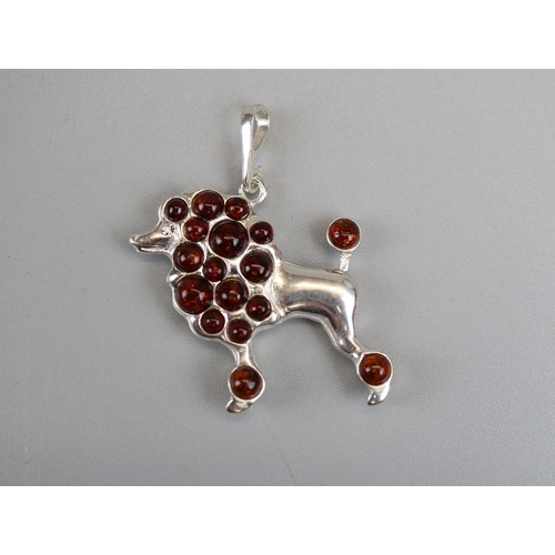 37 - Silver and amber poodle brooch