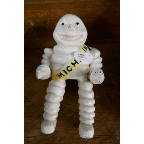 377 - Michelin man figure with another figure