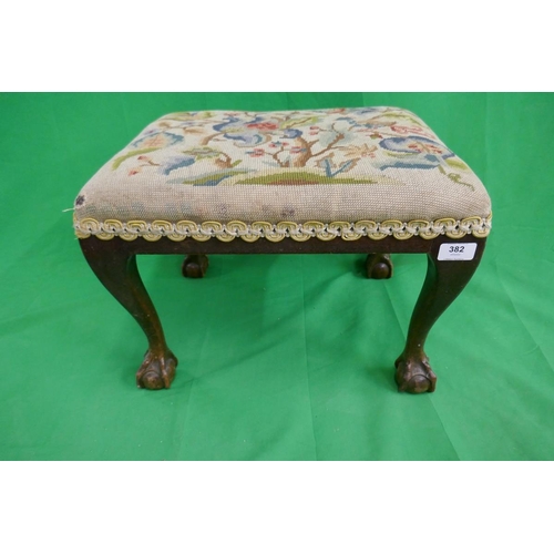 382 - Foot stool on ball and claw feet with tapestry upholstery