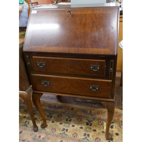 407 - A small walnut bureau