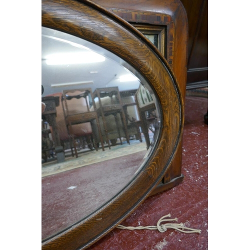 422 - Oak framed bevelled glass mirror together with small mantle mirror