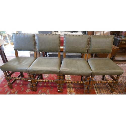 489 - Set of four oak chairs with leather upholstery