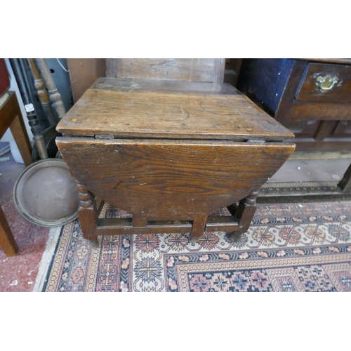 498 - Unusual antique oak chair with drop leaf front