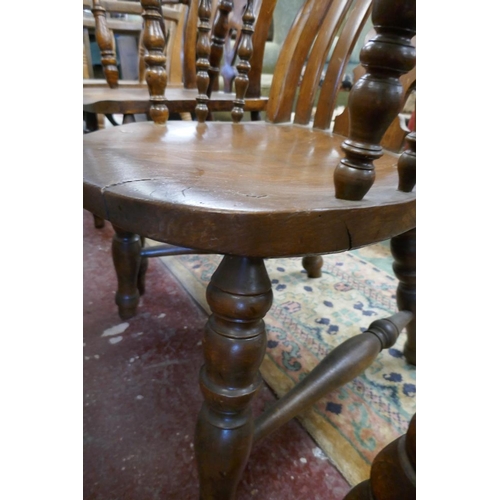 520 - Antique elm seated armchair