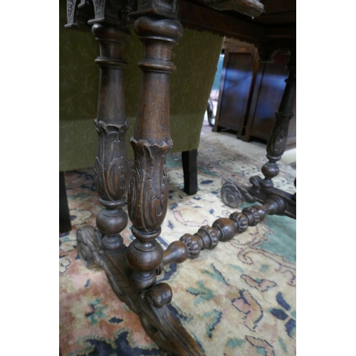 530 - Carved oak centre table