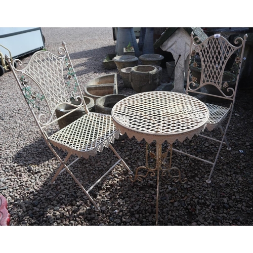 544 - Ornate folding bistro table and 2 chairs 