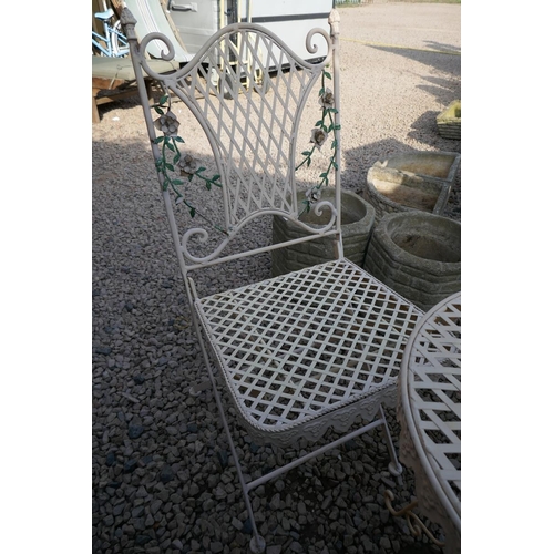 544 - Ornate folding bistro table and 2 chairs 