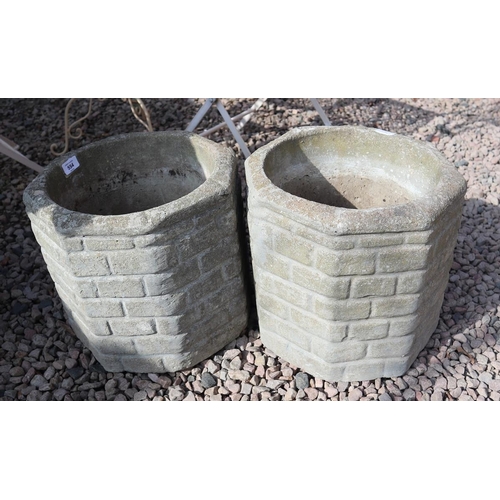 554 - Pair of octagonal stone planters