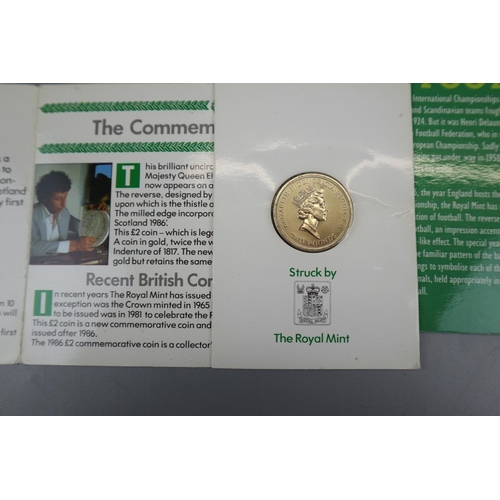 63 - Two boxed £2 coins 1996 Euro cup together with three £2 coins to commemorate Commonwealth games