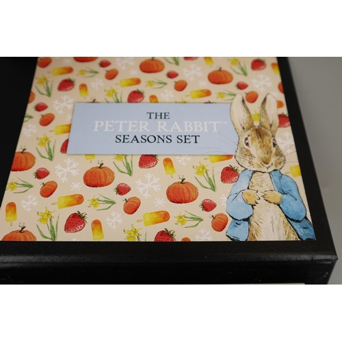 64 - Peter Rabbit coin set