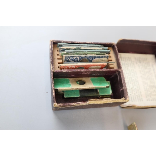 67 - Pocket microscope and slides